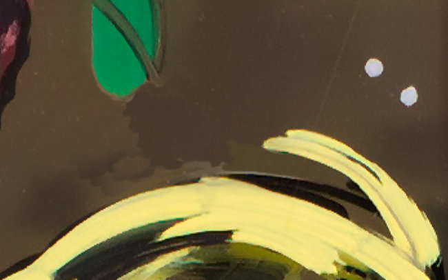 Close-up of the area where the yellow flag once existed. The Clone Stamp has been used to pull in various background brown colours into the area. The Inpainting Brush will cleverly blend these similar colours into a coherent looking new background colour.